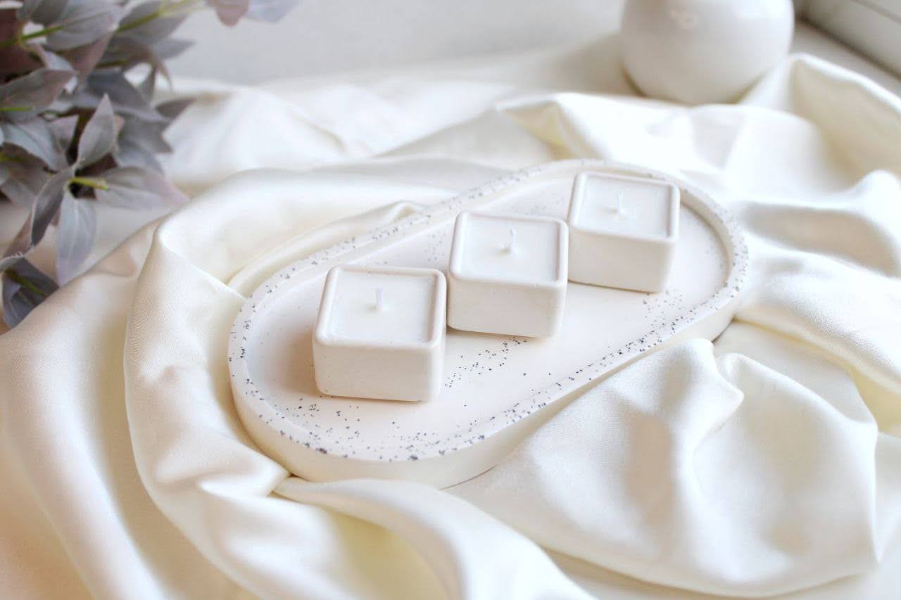 Чайна свічка у гіпсовому кашпо